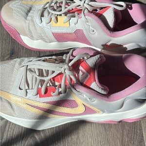 Nike Athletic Shoes with Pink, Yellow, and Cream Accents